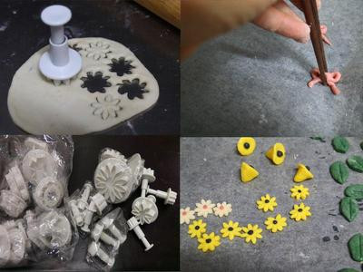 造型花及小裝飾的圖案先做，壓模及做好的造型放在烘焙紙上(底下是盤子)，可以先冰入冰箱裡(上面要蓋住防止表面乾燥)，以免時間過久過發。